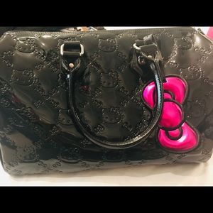 Hello kitty vinyl handbag with HK face embossing